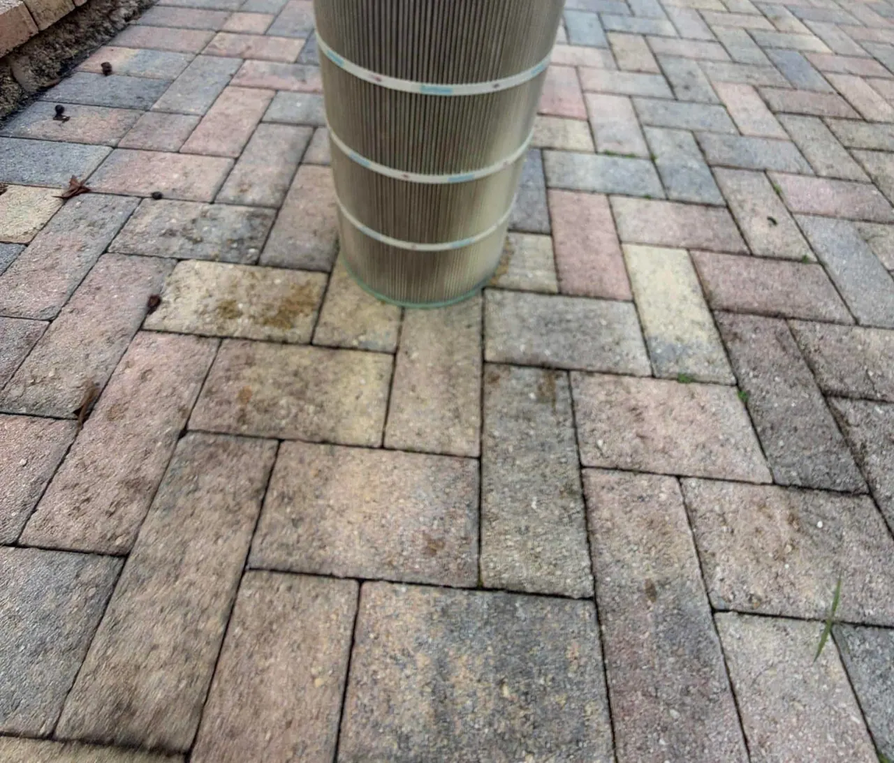A dirty pool cartridge filter before cleaning